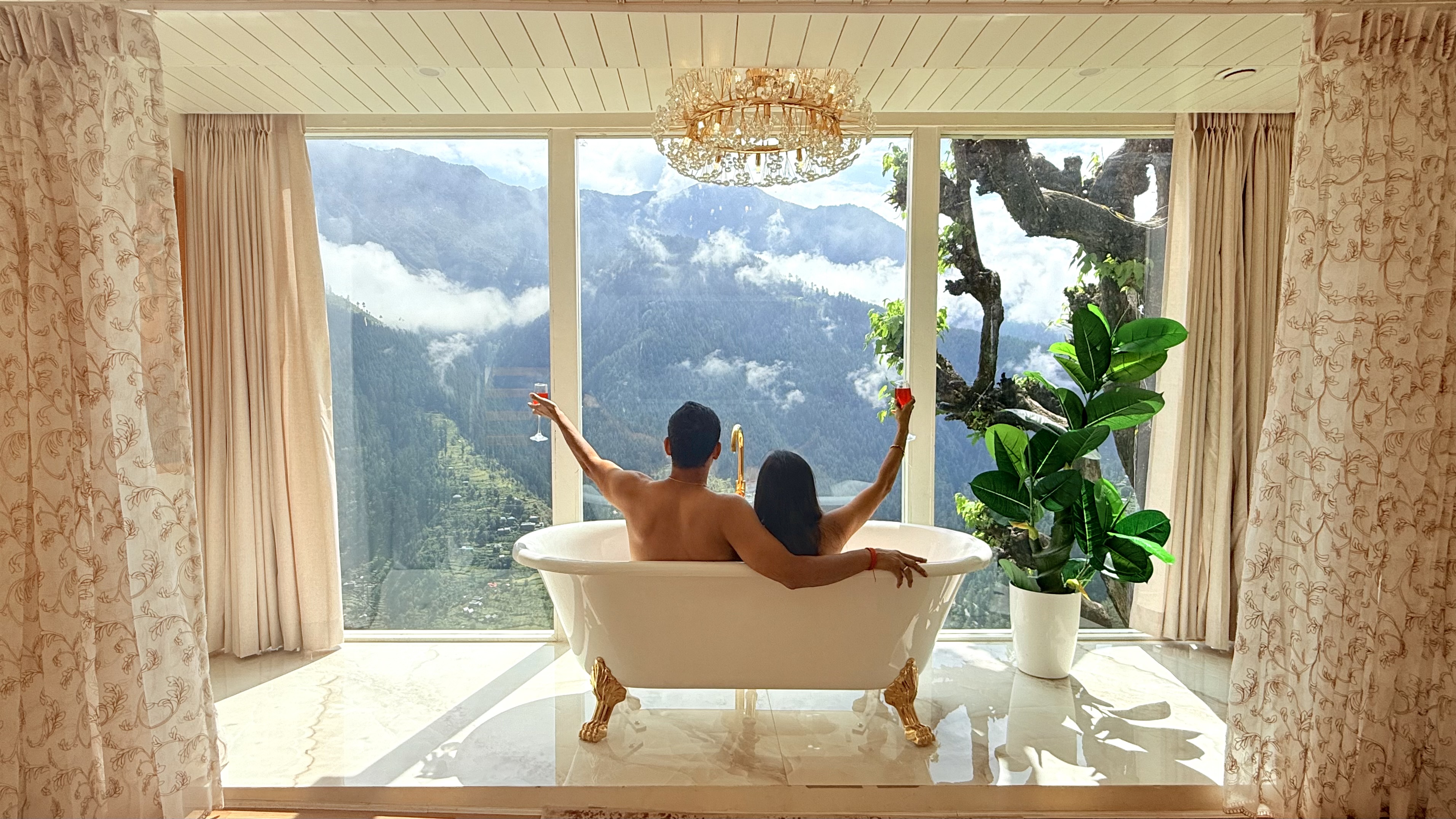 Mountain retreat — sunlit peaks beyond a private cabin